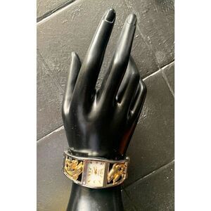 Varsales Two tone Japan Movement Women's Dolphin Cuff Watch, Signed